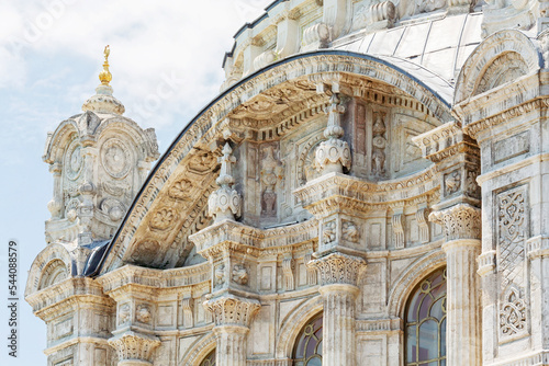 Istanbul, Turkey (Turkiye). Ortakoy Mosque on the banks of the Bosphorus. Close-up fragment of the wall with luxury marble carving. Ottoman baroque, XIX century. Turism or art history concept photo