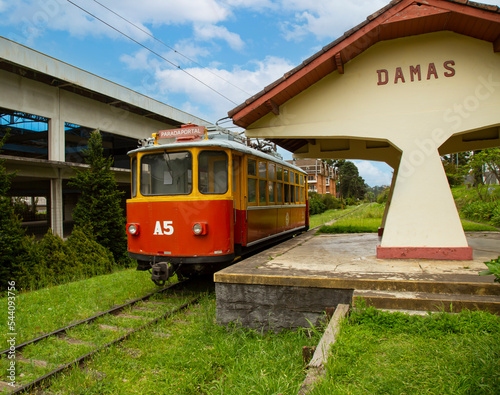 Tram  passing by the station 