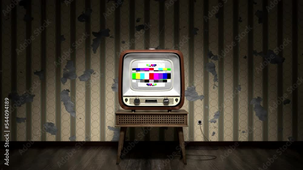 Retro TV receiver with green screen standing on a table, wallpaper with ...