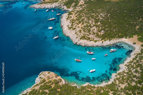 Aerial view of blue sea lagoon and yachts along the mediterranean coast. Landscape of turkish riviera nature photo