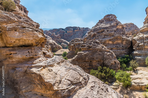 The rocky landscape above the gorge at Little Petra, Jordan in summertime