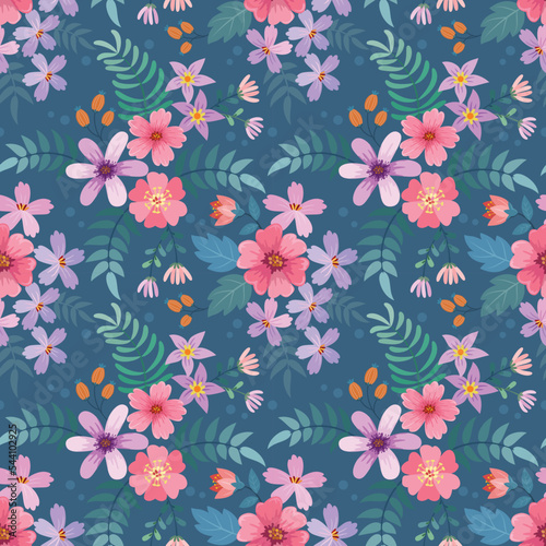 colorful blooming flowers on blue color background seamless patt, textile, wallpaper.