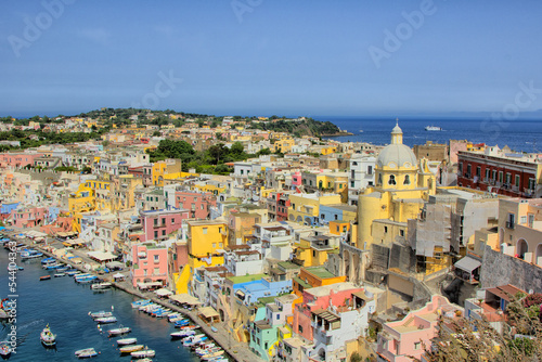 Procida island, Naples, Italy, colorful houses in Marina di Corricella harbour on sunrise light photo