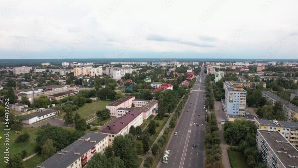 Aerial view of the residential and industrial areas of the city and the central road with heavy traffic Aerial view of the residential and industrial areas of the city and the central road with heavy traffic