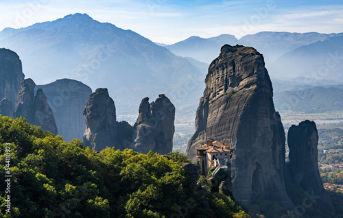 landscape of the Meteora rock formations with the Saint Nikolaos monastery in the foreground photo