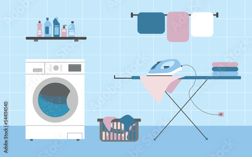 washing machine and ironing board in the bathroom