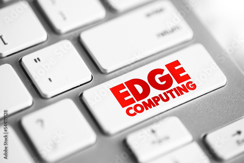 Edge Computing - distributed computing paradigm that brings computation and data storage closer to the sources of data, text concept button on keyboard photo