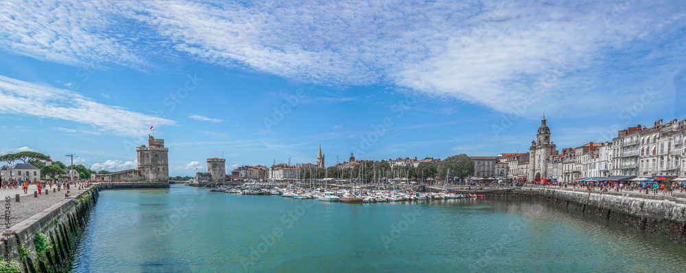 Wide panorama of the Old Port with medieval towers , La Rochelle, Southwestern France.