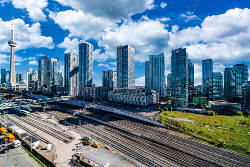 Toronto  train yard  with buildings in background and clouds  photo
