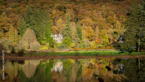 Autumn colours at Loch Ard in Scotland.