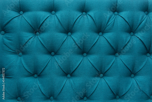 Blue leather upholstery sofa pattern button design furniture style decor texture background decoration vintage abstract
