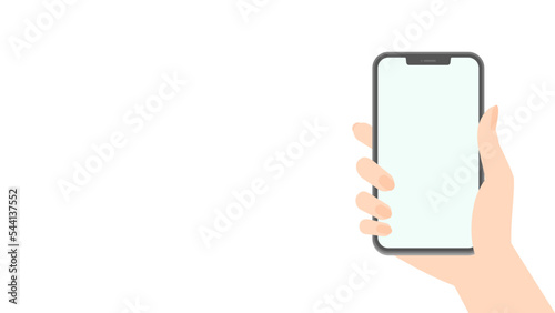 スマホを持つ女性の手 - コピースペースのあるスマートフォンを使っているイメージ素材
