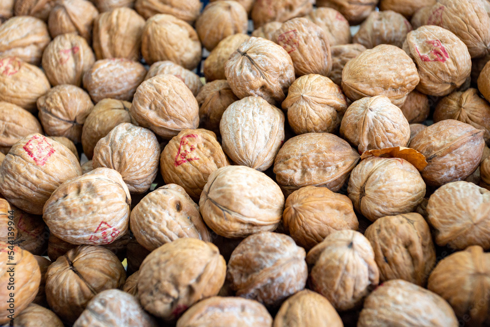 Walnuts for sale at a market stall