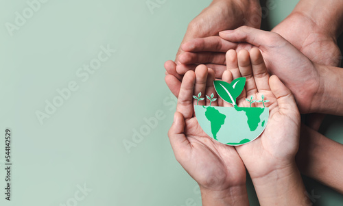 Hands holding growing tree on earth, ESG Environmental, environmental, social, and governance in sustainable and ethical business on the Network connection