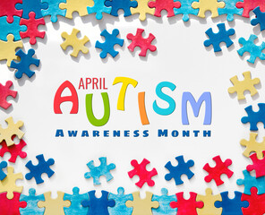 Text, caption World Autism Awareness Day, April written in frame with puzzle pieces. Design of flyer, poster for Health Care Awareness campaign for Autistic disorder.