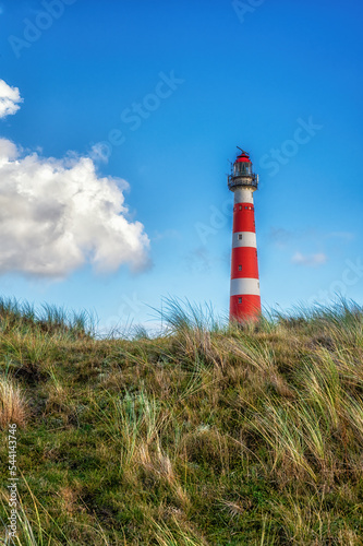 Lighthouse on island of Ameland with blue sky, The Netherlands