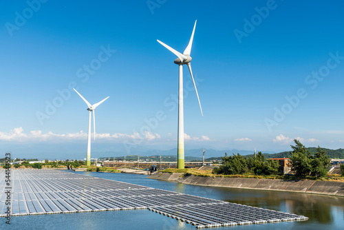 Combining wind power systems and solar power at Houlong Flood Detention Pond in Miaoli, Taiwan. photo