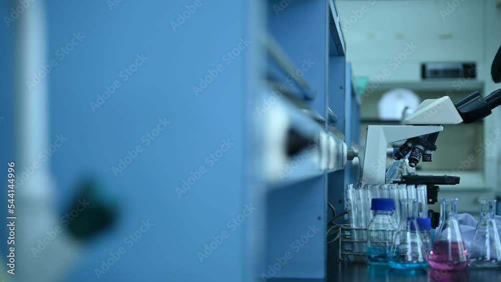 Asian scientist working in the lab,Female doctor use microscope for find experiment from sample,Thailand people,Researcher work in the laboratory Asian scientist working in the lab,Female doctor use microscope for find experiment from sample,Thailand people,Researcher work in the laboratory
