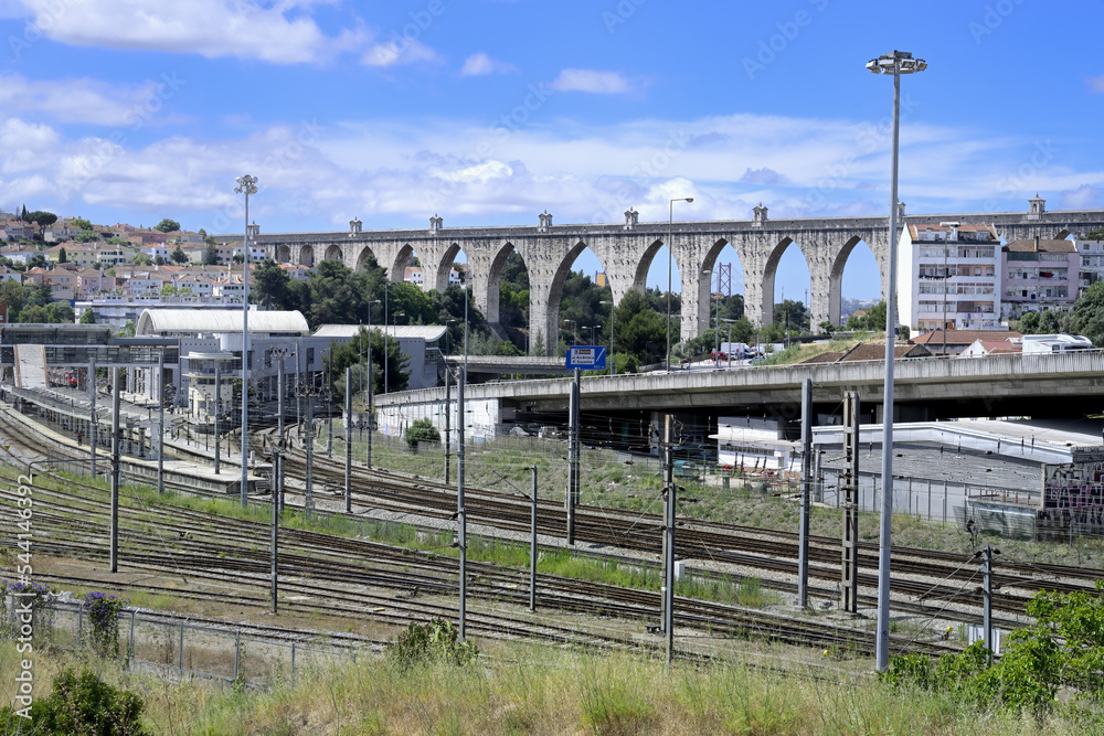 18th century historical Aqueduct of the Free Waters or Águas Livres Aqueduct and railway depot, Lisbon, Portugal
