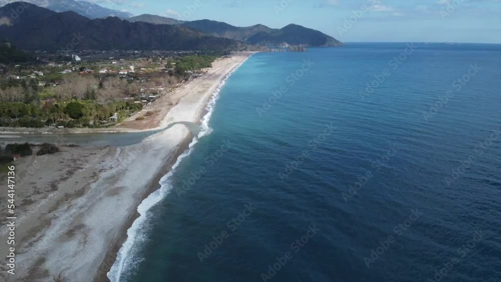 Aerial view of Olympos beach and ruins of ancient Greek-Roman city and Olympos beach on a sunny day. Mediterranean Sea, Turkey. Aerial view of Olympos beach and ruins of ancient Greek-Roman city and Olympos beach on a sunny day. Mediterranean Sea, Turkey.