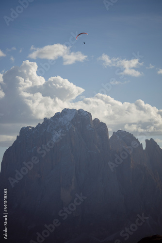 Paraglider over the mountains. Dolomiti, Italy.