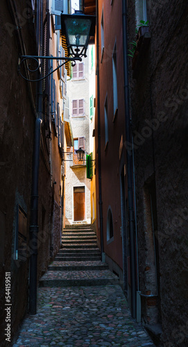 Old narrow street in Morcote, one of the most beautiful villages in Switzerland on the Lake Lugano in the Swiss canton of Ticino. © SeaRain