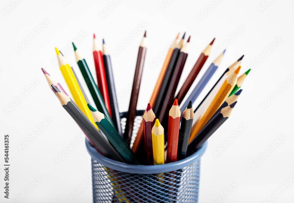 Fototapeta premium Colored pencils of different colour in metal holder