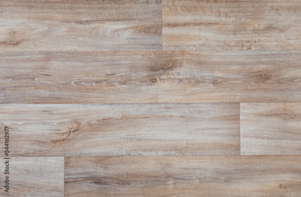 Laminate background. Wooden laminate and parquet flooring in the interior. Texture and pattern of natural wood Laminate background. Wooden laminate and parquet flooring in the interior. Texture and pattern of natural wood