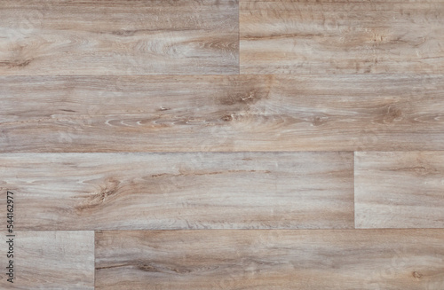 Laminate background. Wooden laminate and parquet flooring in the interior. Texture and pattern of natural wood