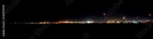 Panoramic view of industrial area at night in Gulf of Izmit Turkey. Factory lights at night. © Mete Caner Arican