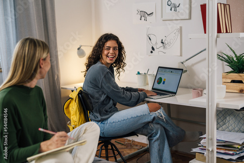 college female students studying in room photo