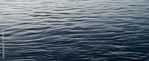 Abstract ocean texture background. Dark blue gray water banner.