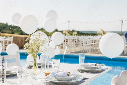 Fototapeta Naklejka Na Ścianę i Meble -  Wedding Setting Around Swimming Pool