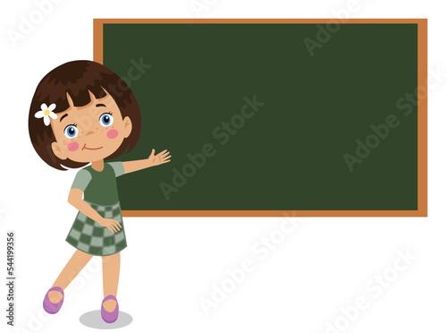 cute boy pointing at the classroom board