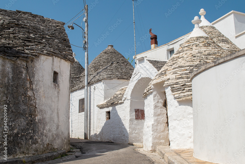 Unique white buildings with conical roof called 