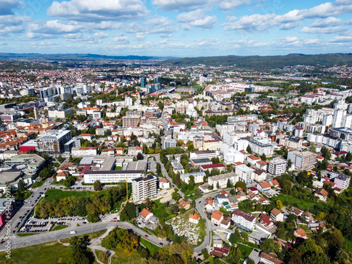 Aerial drone view of Banja Luka, Bosnia and Herzegovina. Buildings, streets, parks and residential houses. City center of Banja Luka, view from above. 