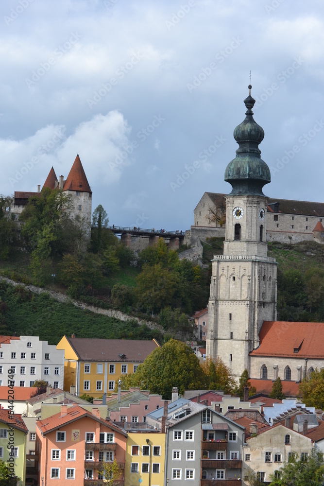 The Burghausen in the old town with its colored houses and the church