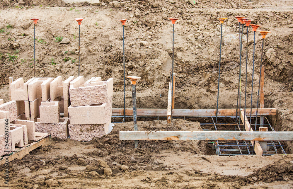 Foto de Details of a Construction Site with Concrete Blocks and Rebar