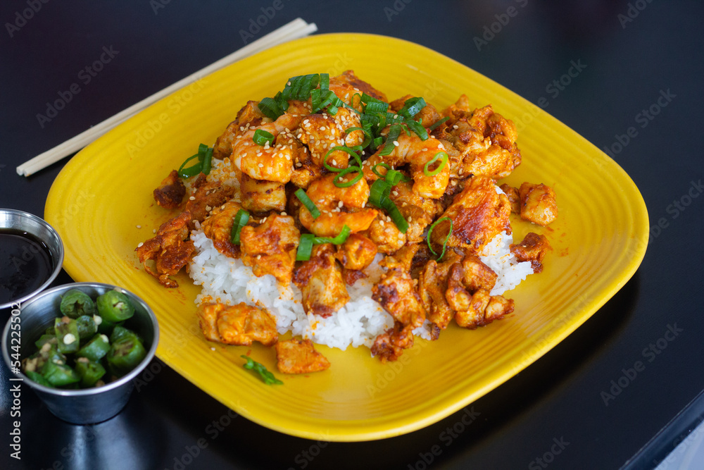 Asian plates with rice and vegetables on top. Japanese food. Asian plates with rice and vegetables on top. Japanese food.