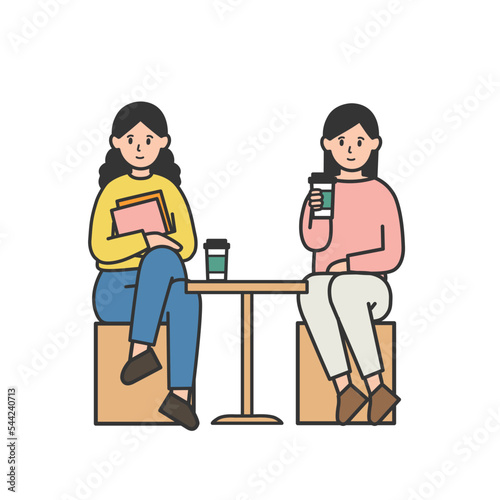 カフェで休憩する若い女性達