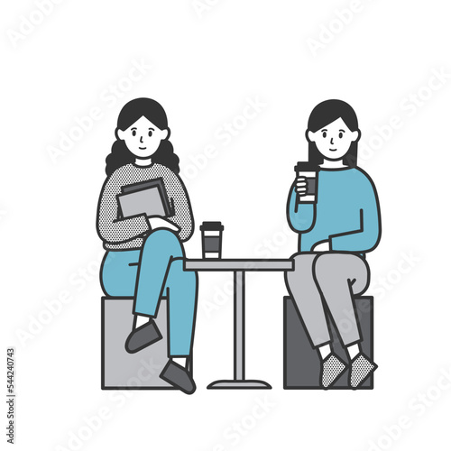 カフェで休憩する若い女性達
