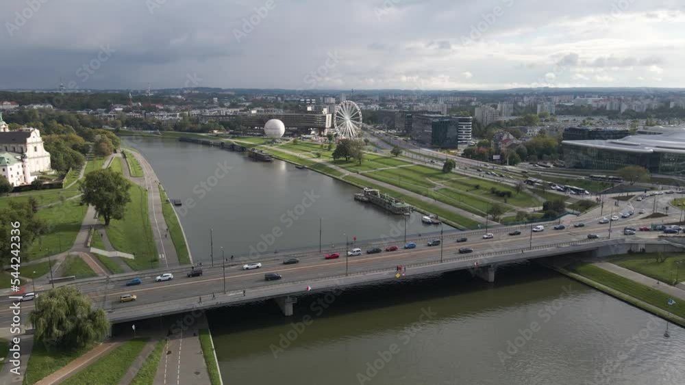 Aerial shot of traffic circulation over a bridge in krakow poland on an overcast day Aerial shot of traffic circulation over a bridge in krakow poland on an overcast day