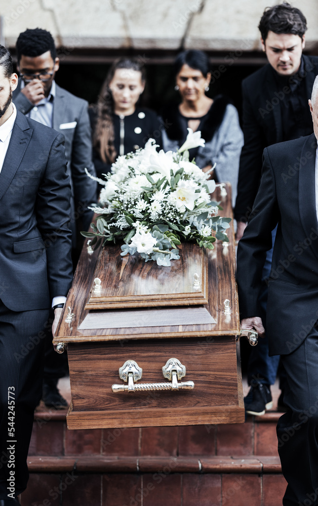 Death, funeral and people with coffin to cemetery, graveyard and