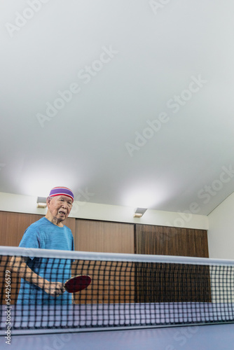 more than 100 years old elderly playing pingpong/ Table Tennis