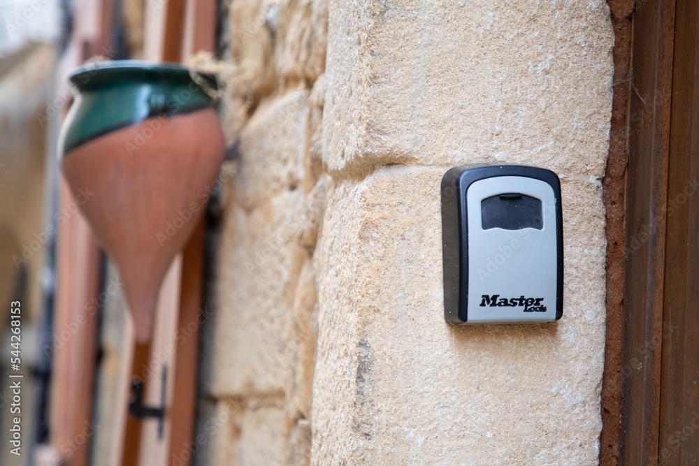 master lock logo text and brand sign on facade outdoor Safe Key Box