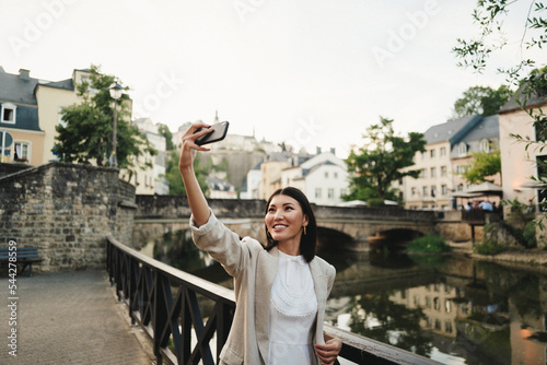 Female tourist taking a selfie in Luxembourg photo