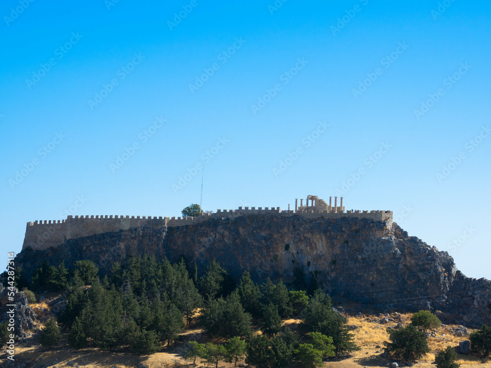 Obraz premium Aerial panaoramic view. Lindos small and famous village. Rhodos Island at Aegean Sea. Greece. Tourism and vacations concept.