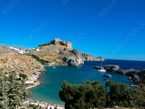 Aerial view of the famouse tourist destination in rhodes island. Village Lindos, with the acropolis and the aegan sea. Dodecanese, Greece.