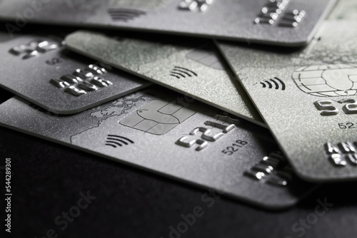 Close-up of a group of bank credit cards on dark background