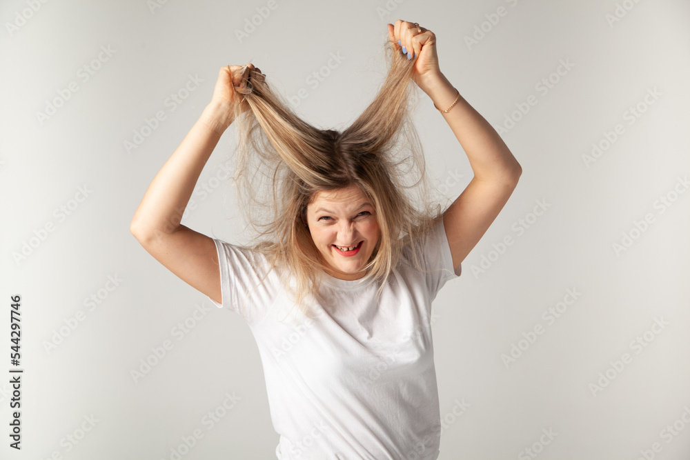Fototapeta premium woman screaming, girl tearing her hair